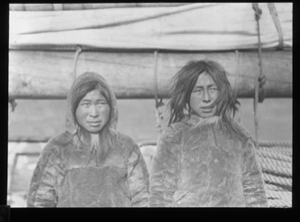 Image of Two Inuit in furs, aboard